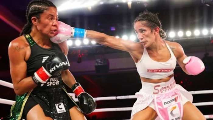 Amanda Serrano punches the face of Danila Ramos during the MVP boxing match. Serrano will square off against Nina Meinke  on Saturday, March 2, in the historic Coliseo de Puerto Rico in San Juan, Puerto Rico. ALEX MENENDEZ/GETTY IMAGES.