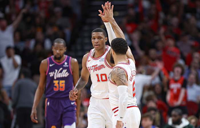 Phoenix Suns forward Kevin Durant (35) reacts and Houston Rockets guard Fred VanVleet (5) celebrates with forward Jabari Smith Jr. (10) after a play during the third quarter at Toyota Center.