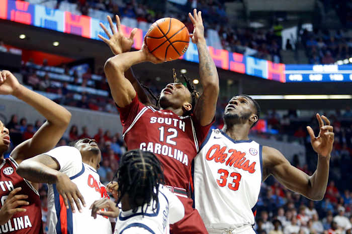 Zachary Davis goes to put the ball back up against three Ole Miss defenders (25th Feb., 2024)