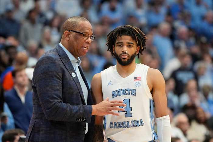 UNC basketball head coach Hubert Davis and guard RJ Davis