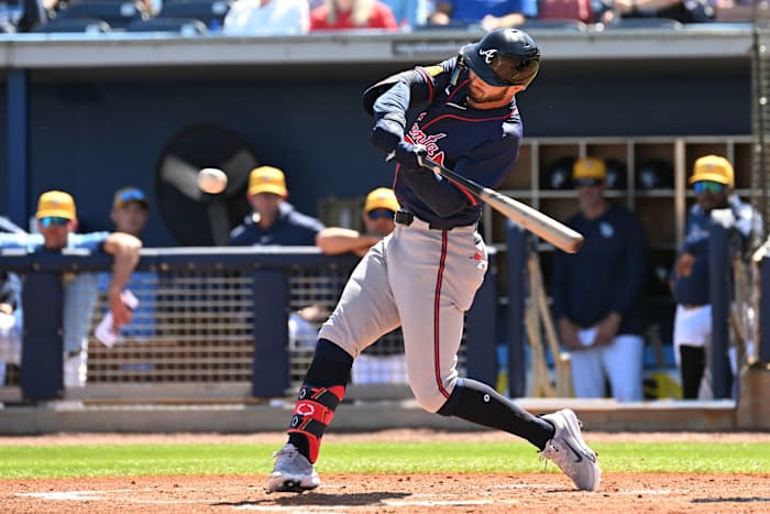 Feb 24, 2024; Port Charlotte, Florida, USA; Atlanta Braves right fielder Forrest Wall (73) hits a RBI single in the second inning of a spring training game against theTampa Bay Rays at Charlotte Sports Park.