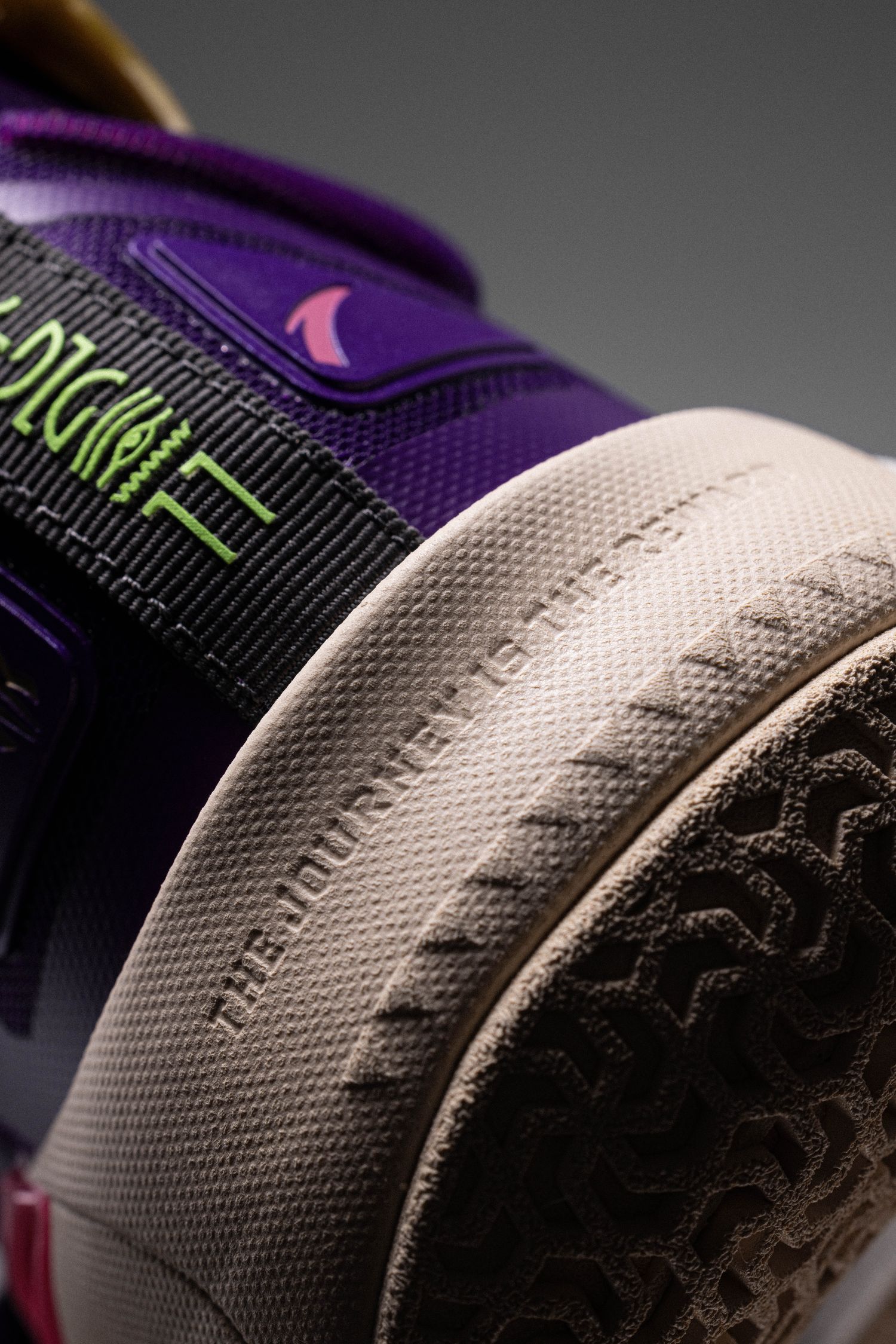 The heel of Kyrie Irving's purple and red ANTA shoe.