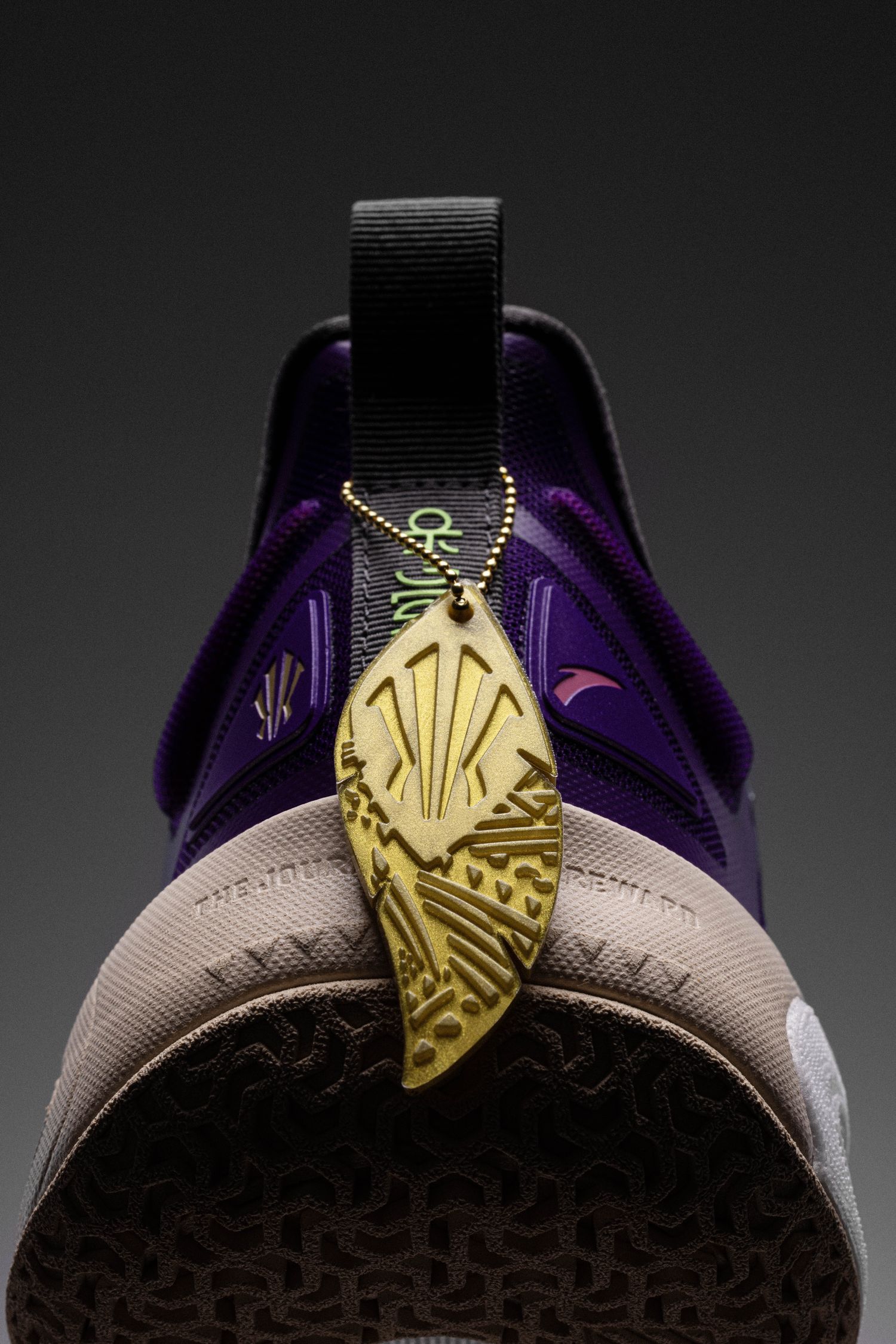 The heel of Kyrie Irving's purple and red ANTA shoe.