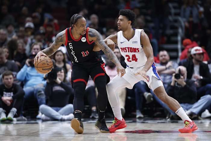 Detroit Pistons guard Quentin Grimes (24) defends against Chicago Bulls forward DeMar DeRozan (11) during the first half at United Center.