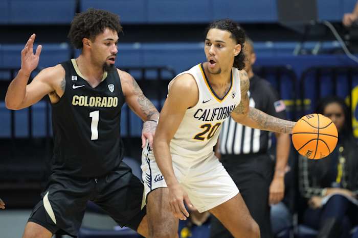 California Golden Bears guard Jaylon Tyson (20) dribbles against Colorado Buffaloes guard J'Vonne Hadley (1) during the first half at Haas Pavilion
