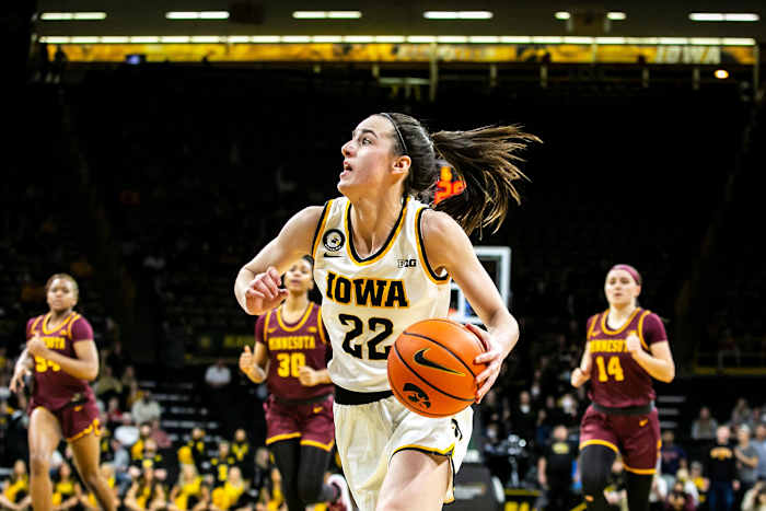 Iowa guard Caitlin Clark (22) drives to the basket during a NCAA Big Ten Conference women's basketball game against Minnesota, Wednesday, Feb. 9, 2022, at Carver-Hawkeye Arena in Iowa City, Iowa.