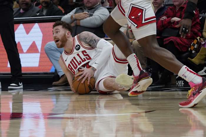 Chicago Bulls forward Onuralp Bitim (17) grabs a loose ball against the Cleveland Cavaliers during the second half at United Center.