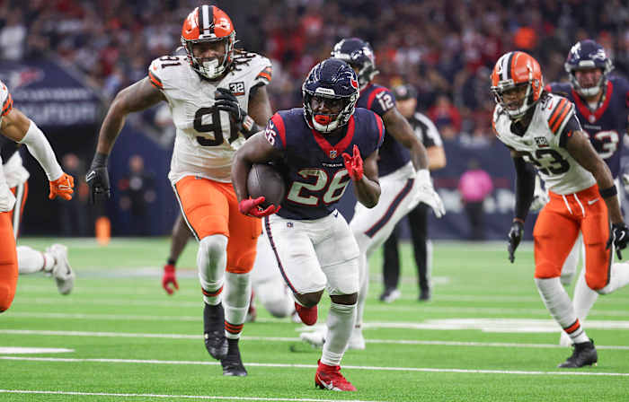 Texans running back Devin Singletary (26) in a 2024 AFC wild card game against the Cleveland Browns at NRG Stadium.