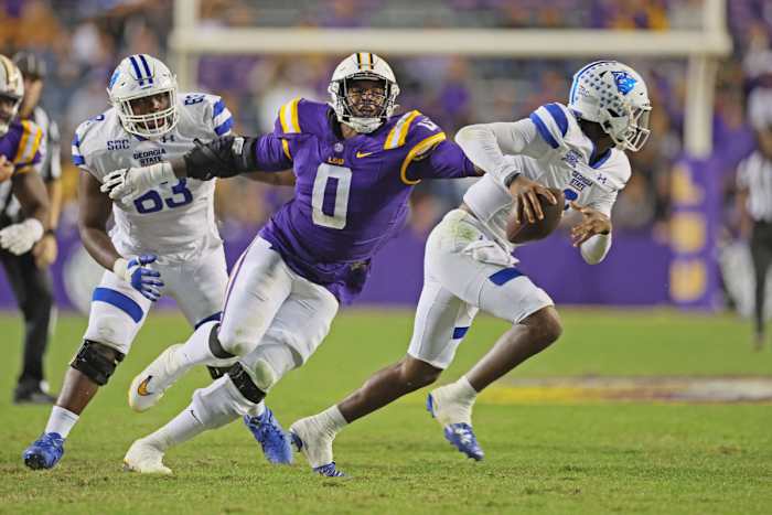 Nov 18, 2023; Baton Rouge, Louisiana, USA; LSU Tigers defensive tackle Maason Smith (0) pressures Georgia State Panthers quarterback Darren Grainger (3) in third quarter action at Tiger Stadium. Mandatory Credit: Matthew Dobbins-USA TODAY Sports
