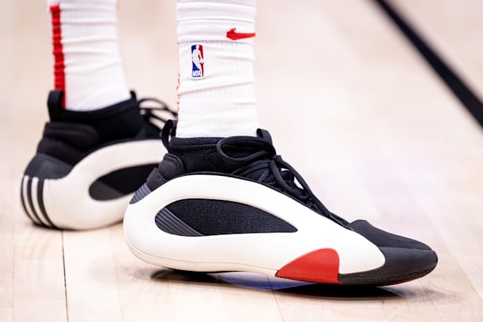 Houston Rockets forward Jabari Smith Jr.'s white and black adidas sneakers.