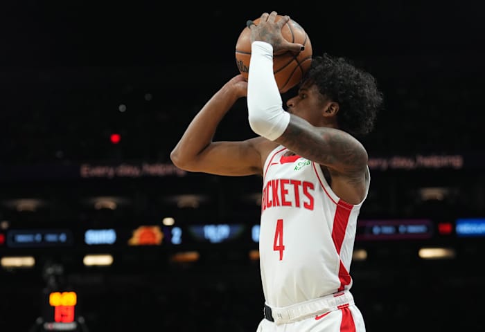 Rockets guard Jalen Green (4) shoots against the Phoenix Suns during the first half at Footprint Center.
