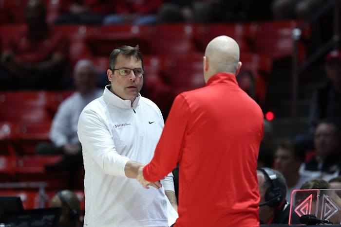 Feb 29, 2024; Salt Lake City, Utah, USA; Stanford Cardinal head coach Jerod Haase shakes hands with Utah Utes head coach Craig Smith after the game at Jon M. Huntsman Center. Mandatory Credit: Rob Gray-USA TODAY Sports