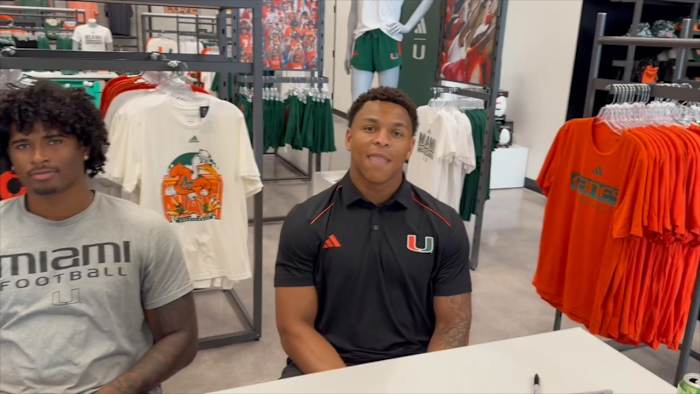 Miami Hurricanes stars Bain, Porter, Wayne, and Aguirre sign autographs at fan event
