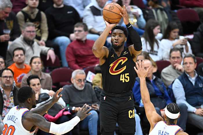 Oct 31, 2023; Cleveland, Ohio, USA; Cleveland Cavaliers guard Donovan Mitchell (45) shoots in the third quarter against the New York Knicks at Rocket Mortgage FieldHouse.