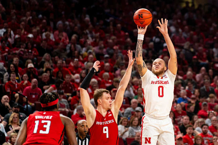 Mar 3, 2024; Lincoln, Nebraska, USA; Nebraska Cornhuskers guard C.J. Wilcher (0) shoots a 3-point shot against Rutgers Scarlet Knights forward Oskar Palmquist (9) at Pinnacle Bank Arena.