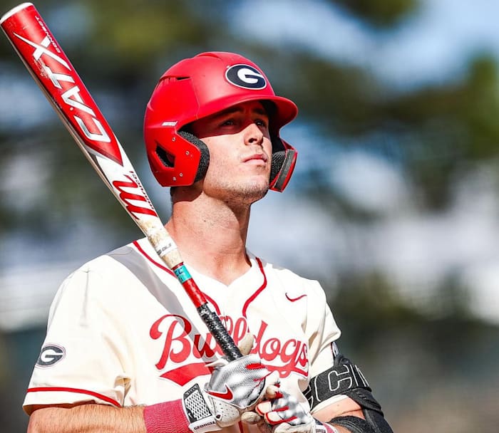 All-American Georgia slugger Charlie Condon looks on as he awaits an at-bat.