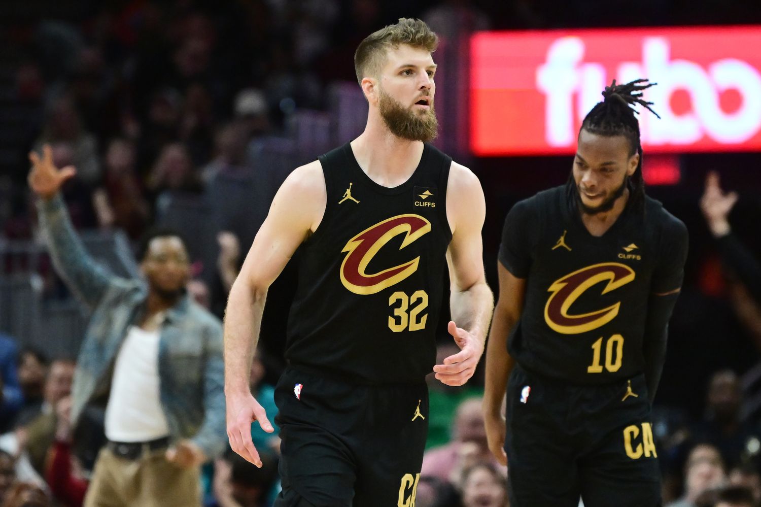 Mar 5, 2024; Cleveland, Ohio, USA; Cleveland Cavaliers forward Dean Wade (32) and guard Darius Garland (10) react after Wade hit a three-point basket during the second half against the Boston Celtics at Rocket Mortgage FieldHouse. Mandatory Credit: Ken Blaze-USA TODAY Sports