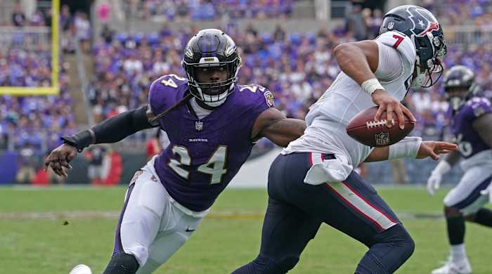 Ravens edge rusher Jadeveon Clowney pursues Texans QB C.J. Stroud in the backfield