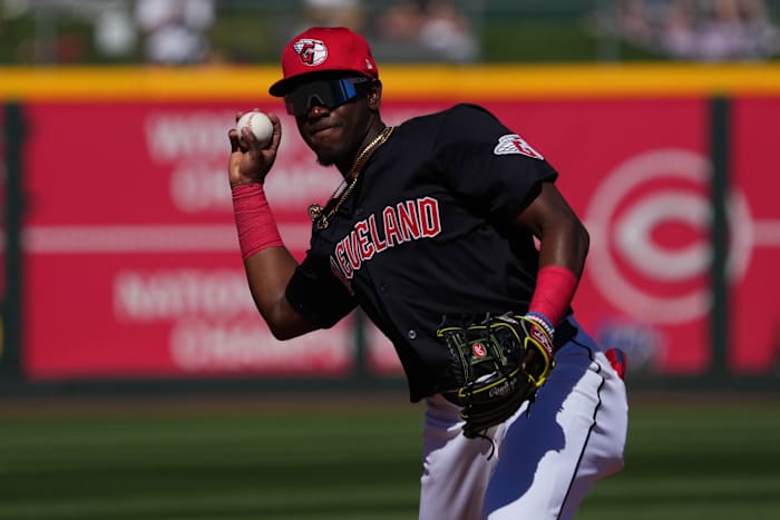 Mar 2, 2024; Goodyear, Arizona, USA; Cleveland Guardians second baseman Angel Martinez (79) throws to first against the Kansas City Royals during the second inning at Goodyear Ballpark.