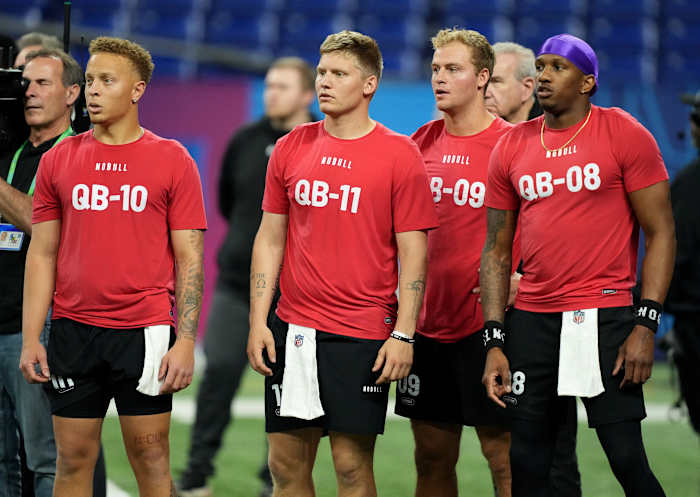 South Carolina quarterback Spencer Rattler (QB10), Western Kentucky quarterback Austin Reed (QB11), Tulane quarterback Mike Pratt (QB09) and Washington quarterback Michael Penix (QB08) during the 2024 NFL Combine at Lucas Oil Stadium.