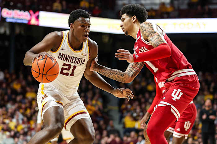 Minnesota Golden Gophers forward Pharrel Payne (21) works around Indiana Hoosiers center Kel'el Ware (1) during the first half at Williams Arena.