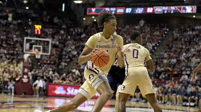 Florida State Seminoles forward Baba Miller (11) drives the ball to the rim against the Virginia Cavaliers during the second half at Donald L. Tucker Center.