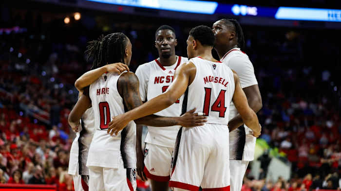 North Carolina State Wolfpack huddles during the first half against Duke Blue Devils at PNC Arena.