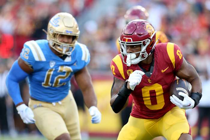 USC Trojans running back MarShawn Lloyd (0) runs during the second quarter against the UCLA Bruins at United Airlines Field at Los Angeles Memorial Coliseum.