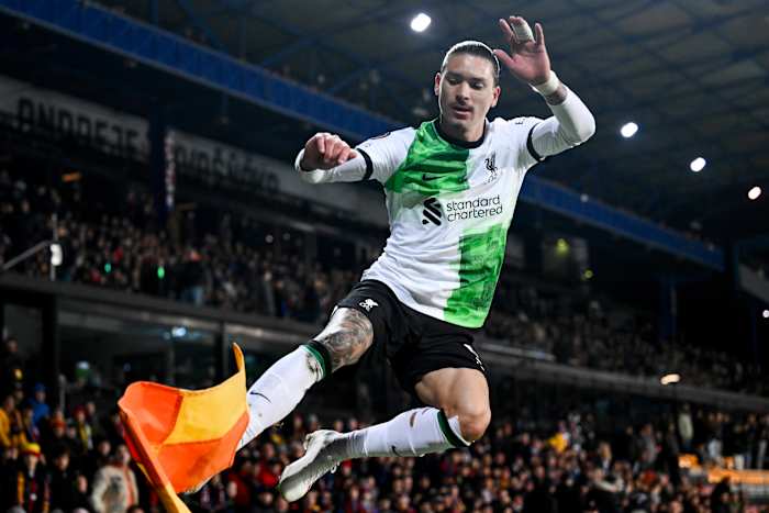 Darwin Nunez pictured celebrating by kicking the corner flag after scoring two goals for Liverpool in a 5-1 win over Sparta Prague in March 2024