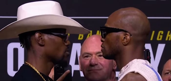 UFC 299 fighters Kevin Holland and Michael "Venom" Page stare down.