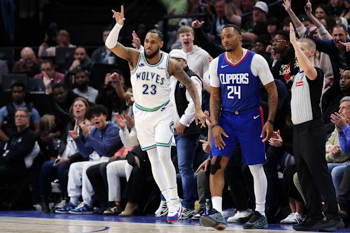 Mar 3, 2024; Minneapolis, Minnesota, USA; Minnesota Timberwolves guard Monte Morris (23) celebrates his three-point basket against the LA Clippers during the second half at Target Center.
