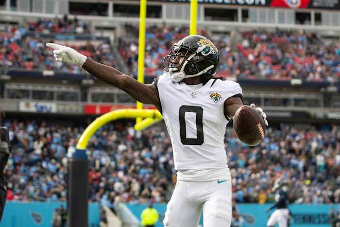 Jan 7, 2024; Nashville, Tennessee, USA; Jacksonville Jaguars wide receiver Calvin Ridley (0) reacts after scoring a touchdown against the Tennessee Titans during the first half at Nissan Stadium.