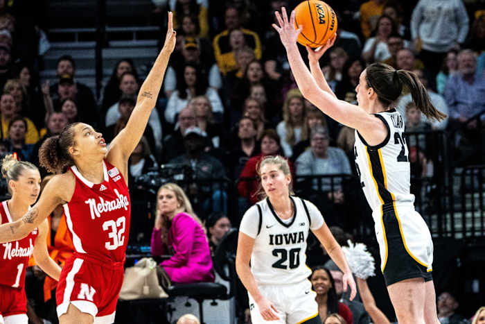 Iowa guard Caitlin Clark (22) attempts a 3-pointer during the Big Ten Tournament championship game at the Target Center on Sunday, March 10, 2024, in Minneapolis, Minn.  