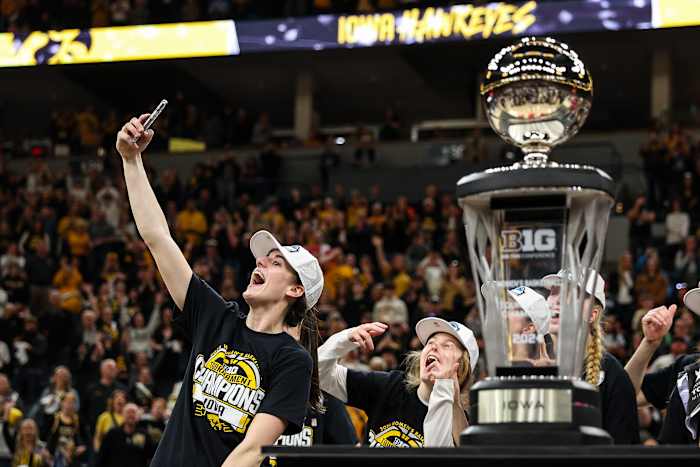Iowa guard Caitlin Clark (22) celebrates the win after the game against Nebraska at Target Center in Minneapolis on March 10, 2024.