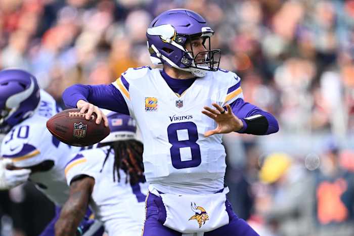 Oct 15, 2023; Chicago, Illinois, USA; Minnesota Vikings quarterback Kirk Cousins (8) passes in the first half against the Chicago Bears at Soldier Field.