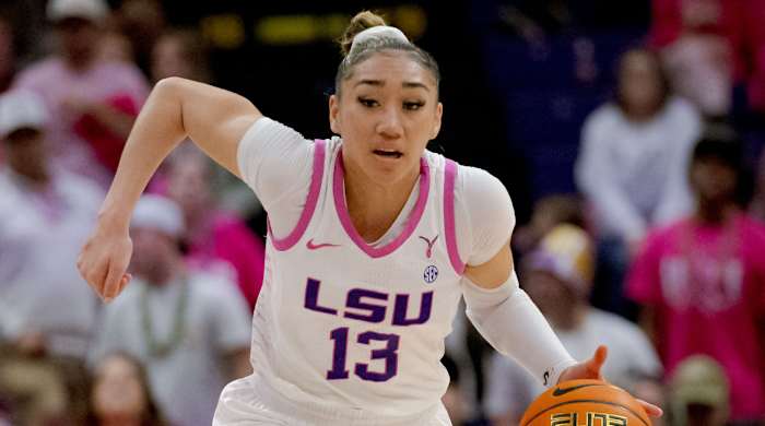 LSU guard Last-Tear Poa runs the ball to the hoop.