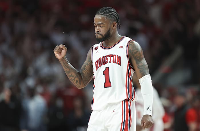 Mar 9, 2024; Houston, Texas, USA; Houston Cougars guard Jamal Shead (1) reacts after a play during the first half against the Kansas Jayhawks at Fertitta Center. 