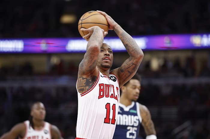 Chicago Bulls forward DeMar DeRozan (11) shoots a free throw against the Dallas Mavericks during the first half at United Center.