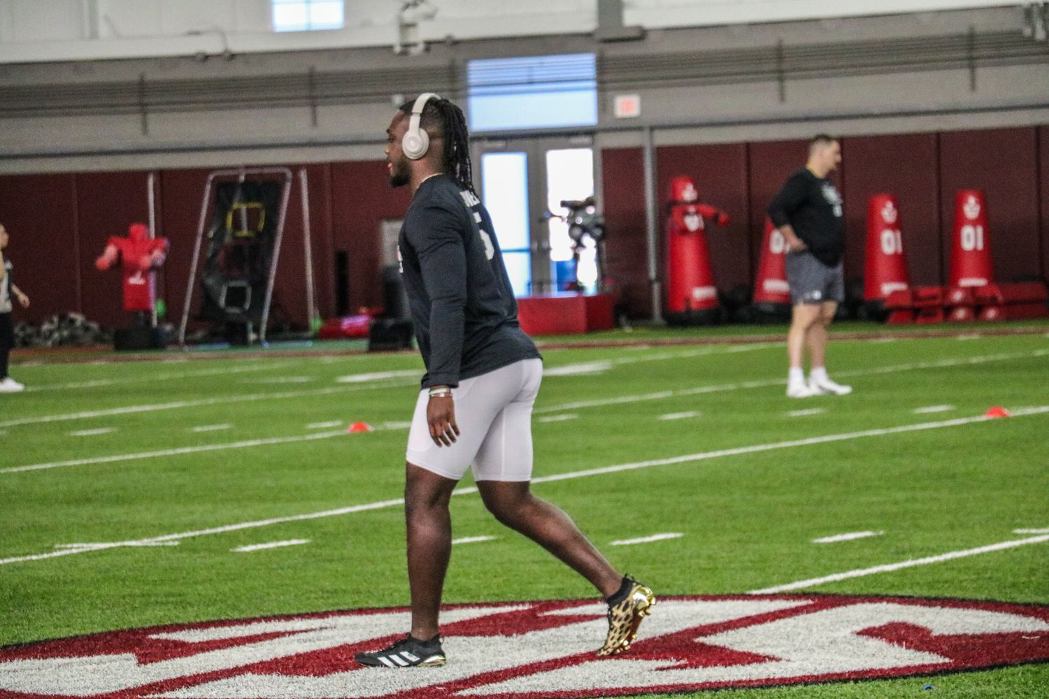 Dakereon Joyner listens to music through his Beats headphones to get his mind right