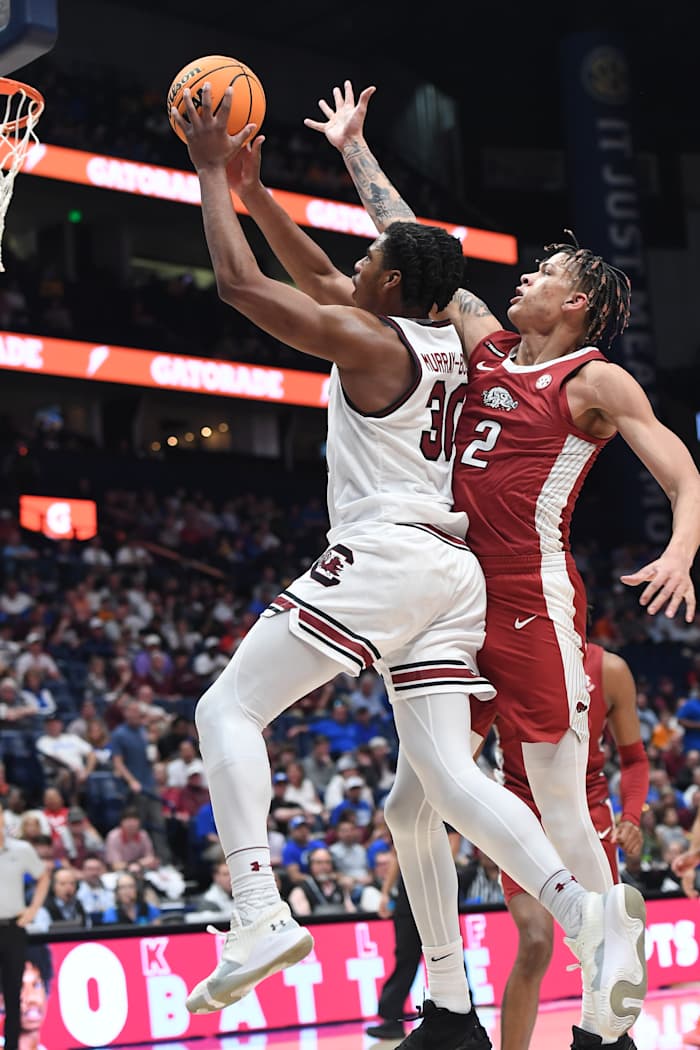 Collin Murray-Boyles scores against Arkansas Razorbacks forward Trevon Brazile (14th Mar., 2024)