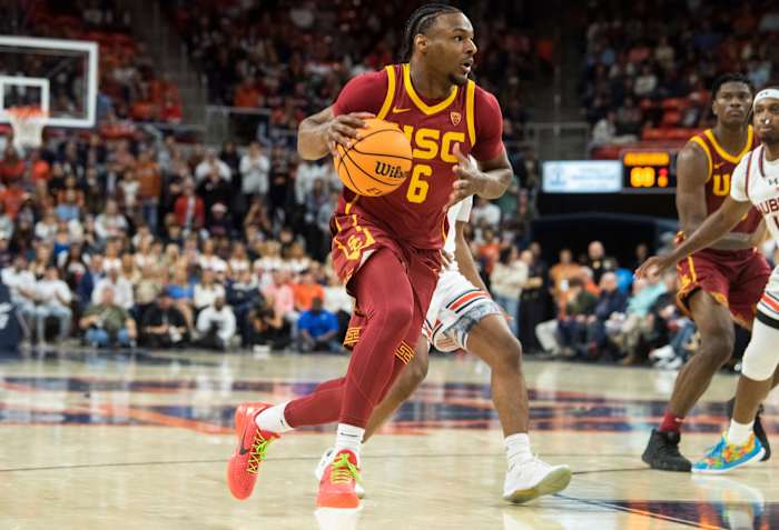 USC Trojans guard Bronny James dribbles the basketball to the rim.