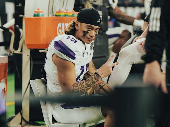 Kamren Fabiculanan takes a break acknowledges his presence at the CFP title game.
