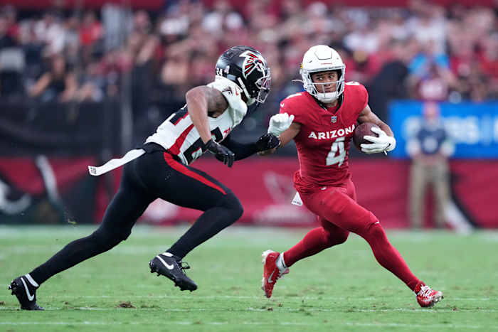 Nov 12, 2023; Glendale, Arizona, USA; Arizona Cardinals wide receiver Rondale Moore (4) runs against Atlanta Falcons cornerback A.J. Terrell (24) during the first half at State Farm Stadium.