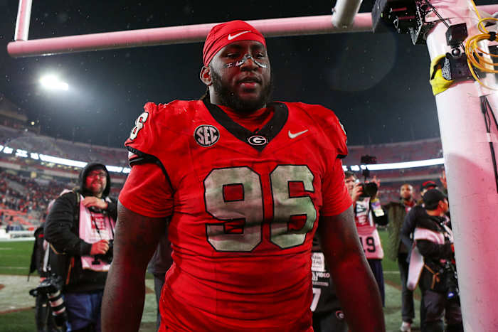 Nov 11, 2023; Athens, Georgia, USA; Georgia Bulldogs defensive lineman Zion Logue (96) walks off the field after a victory against the Mississippi Rebels at Sanford Stadium.