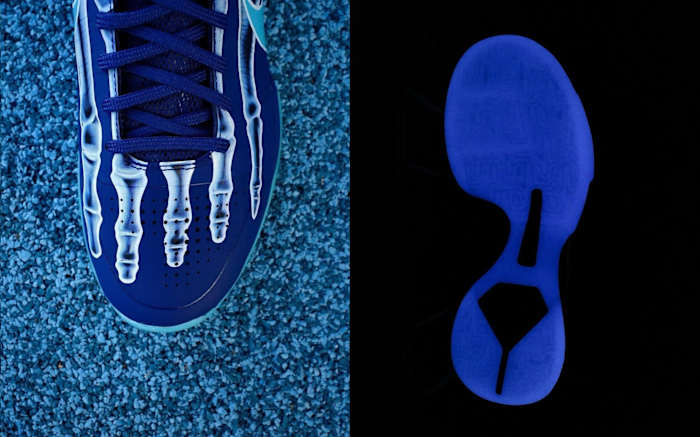 Black and blue Nike Kobe sneakers.