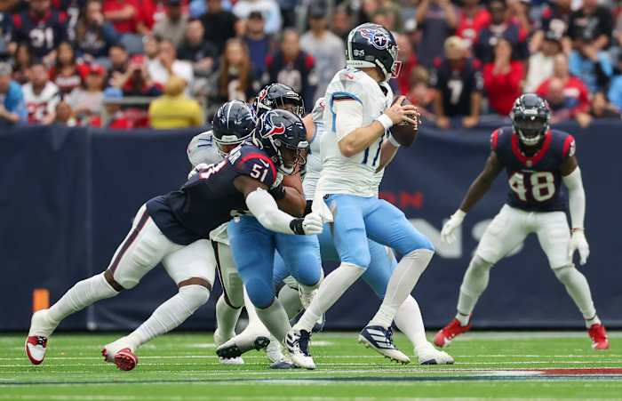 Titans quarterback Ryan Tannehill (17) is sacked by Houston Texans defensive end Will Anderson Jr. (51) in the second quarter at NRG Stadium.