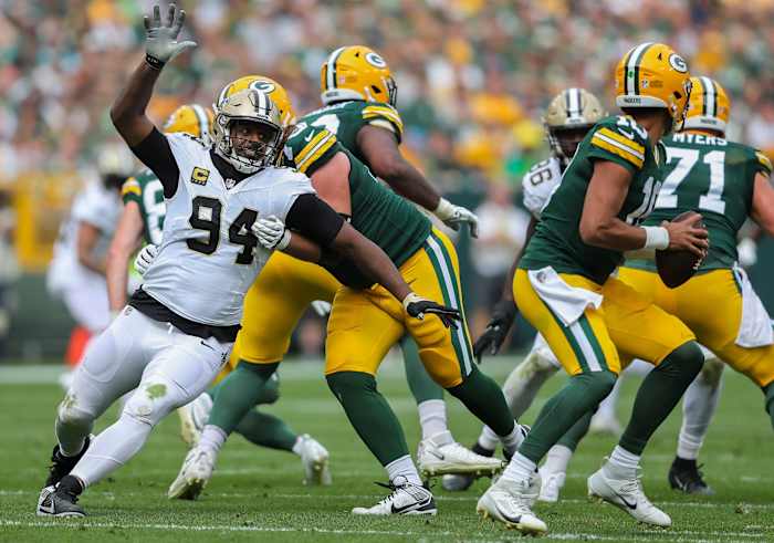 New Orleans Saints defensive end Cameron Jordan (94) rushes Green Bay Packers quarterback Jordan Love (10). © Tork Mason / USA TODAY NETWORK