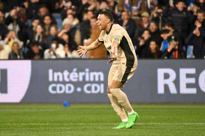 Kylian Mbappe pictured celebrating after scoring three goals for Paris Saint-Germain in a 6-2 win over Montpellier in March 2024