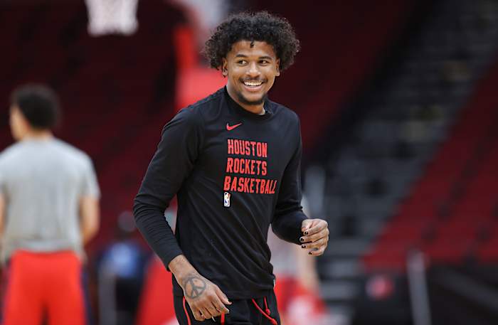 Rockets guard Jalen Green (4) smiles on the court before the game against the Washington Wizards at Toyota Center.