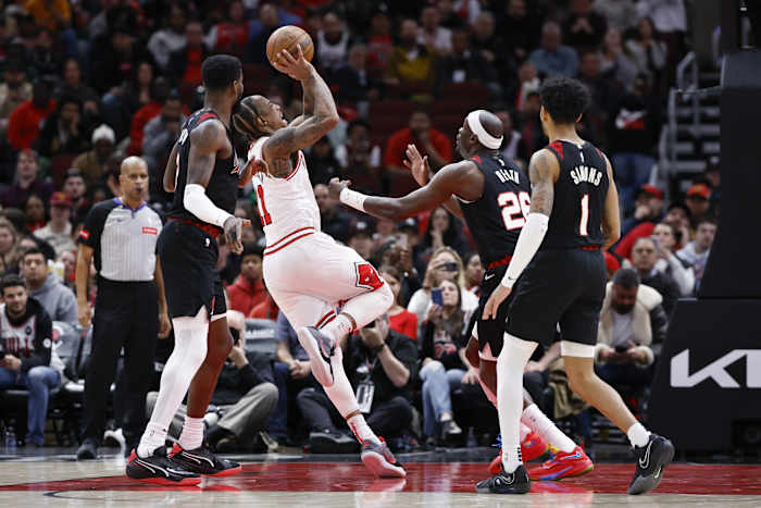 Chicago Bulls forward DeMar DeRozan (11) shoots against the Portland Trail Blazers during the second half at United Center.